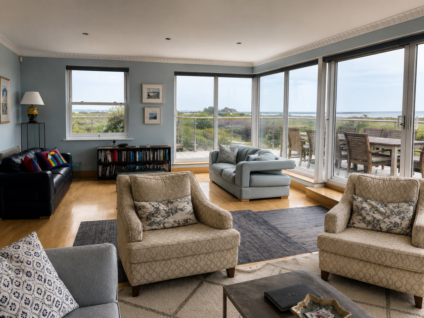 Spacious living room with sea views for corporate groups at Wittering Sands