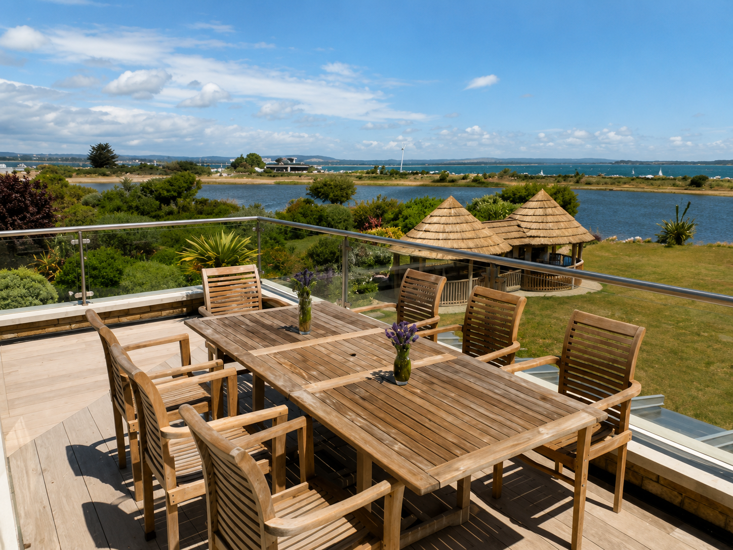Terrace dining table overlooking the water at Wittering Sands, Hayling Island