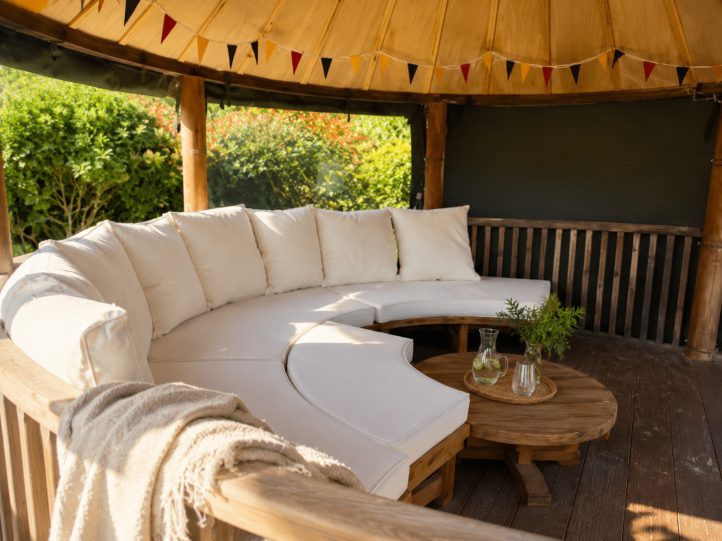 Gazebo lounge seating in the waterside garden at Wittering Sands, Hayling Island