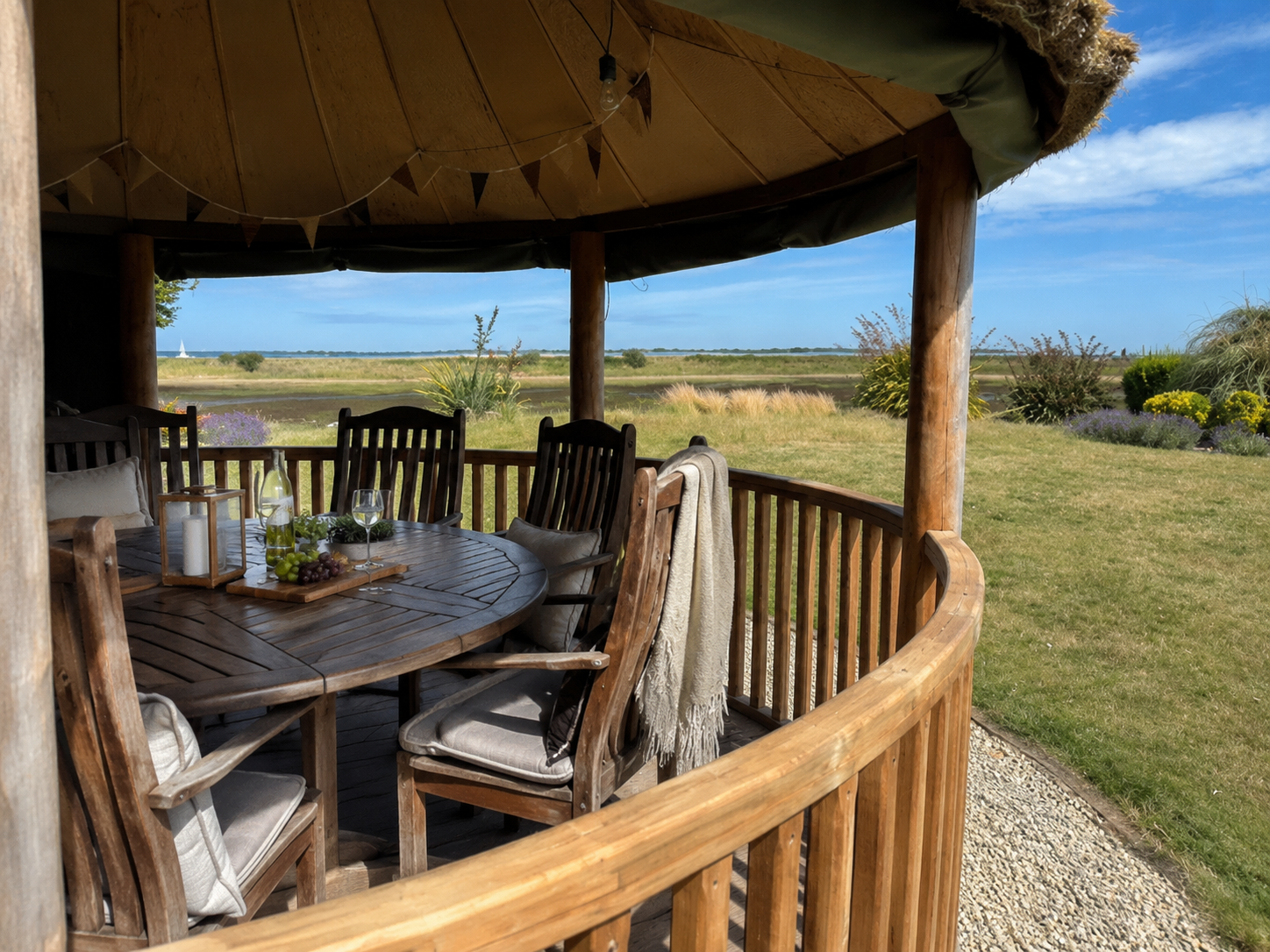 Outdoor gazebo dining with harbour views at Wittering Sands, Hayling Island